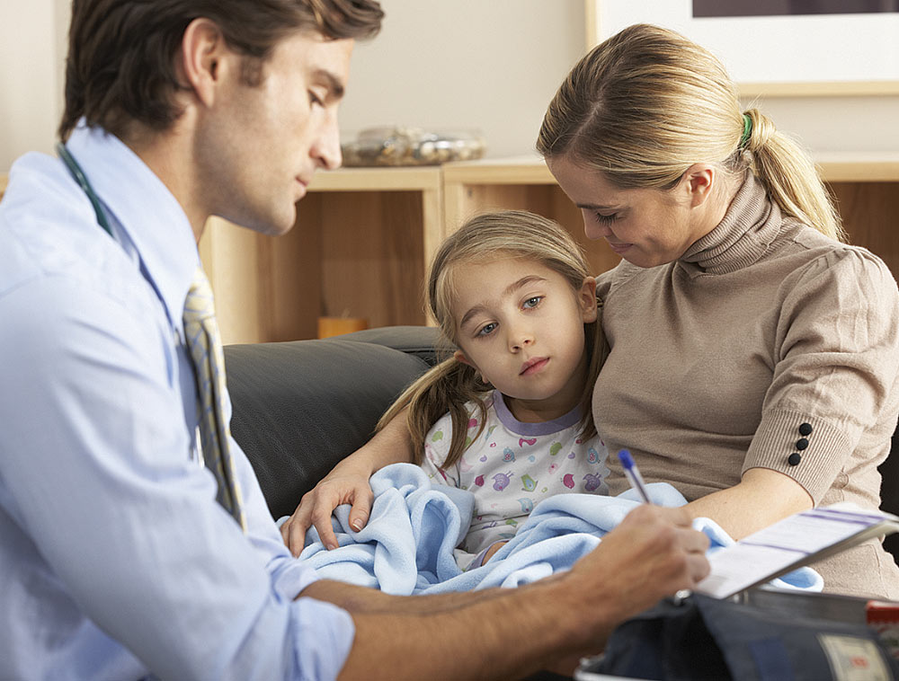 Doctor Taking Notes on Patient Doctor Taking Notes on Patient